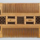 Comb - with 'Qui bien aime tard oublie' inscription