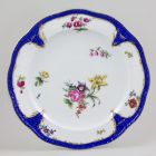 Plate - With blue scales and flower decoration