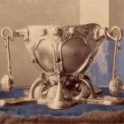 Photograph - Decorative vessel, iridescent glass in silver holder