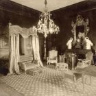 Interior photograph - bedroom with a Boulle clock on the mantelpiece in the Pálffy Palace of Királyfa