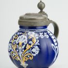 Fluted jug with pewter lid