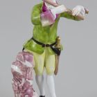 Statuette - flute-playing miner