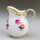Small cream jug - decorated with flower bouquets