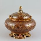 Ornamental vessel with lid