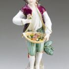 Statuette (figure) - young man with a basket of flower