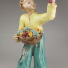 Sculpture - Boy with a basket of fruit