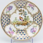 Saucer - Decorated in the well with landscape and colourful bird