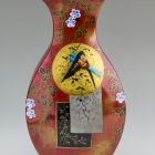 Vase - With a red enamel-like surface and bird and plant motifs