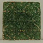 Stove tile - With lattice and rosette patterns
