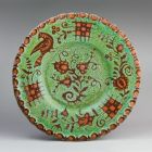 Wall platter - With figure of a bird and floral branches