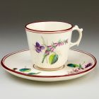 Coffee cup with saucer