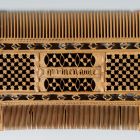 Comb - with 'Qui bien aime tard oublie' inscription