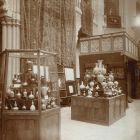 Exhibition photograph - Christmas Exhibition in the great hall of Museum of Applied Arts, with the painted gallery from the Calvinist church of Mezőcsát in the background