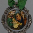 Baptismal medallion - depicting the Adoration of the Shepherds, with inscription  'Zum Andenken von meinen Taufpathen, Ignaz u. Anna Linzboth, 1849'