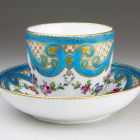 Coffee cup with saucer