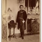Portrait photograph - Kornél Emmer, judge of the Curia in Hungarian gala costume in the salon of the Emmer Palace, Buda