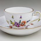 Coffee cup with saucer