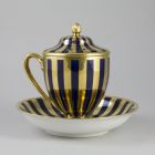 Cup with lid and saucer