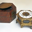 Table clock - with horizontal dial, in leather case