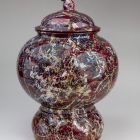 Ornamental vessel with lid