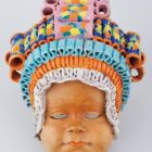 Wall plaque - Incan (?) child with headdress
