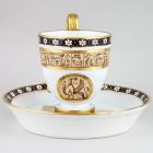 Cup and saucer - With Egyptian style decoration and fictive hieroglyphs